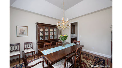 White walls and wood floors in the dining room. The Charlevoix plan 1068,