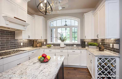 Kitchen island and window picture for house plan 1322 The Charlton