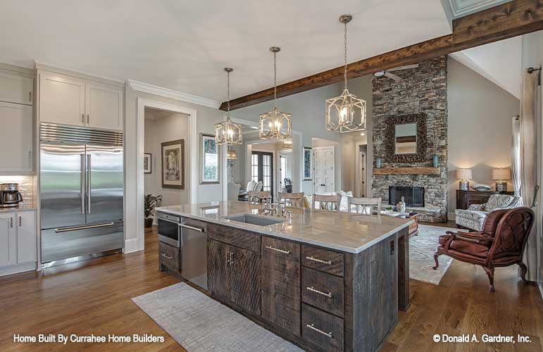 Kitchen item with the sink and stainless-steel appliances. The Chatsworth plan 1301.