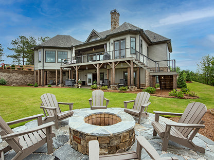 Relaxing firepit with a rear view of the home. The Chatsworth plan 1301.