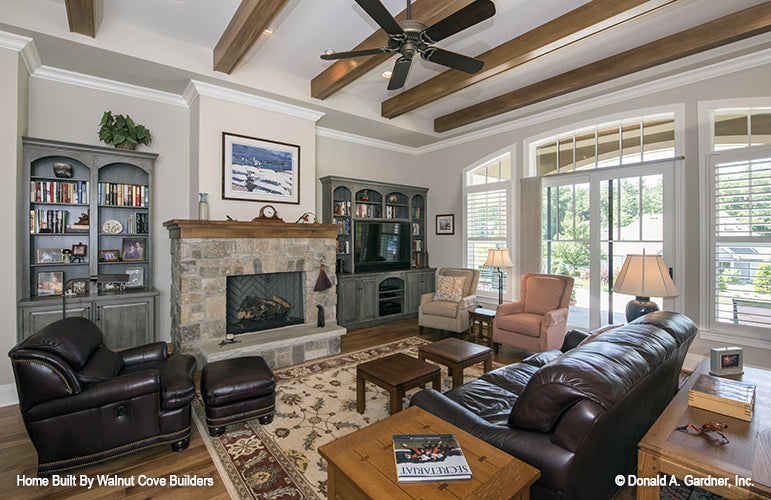 Great room with beams and fireplace picture for Chesnee house plan 1290