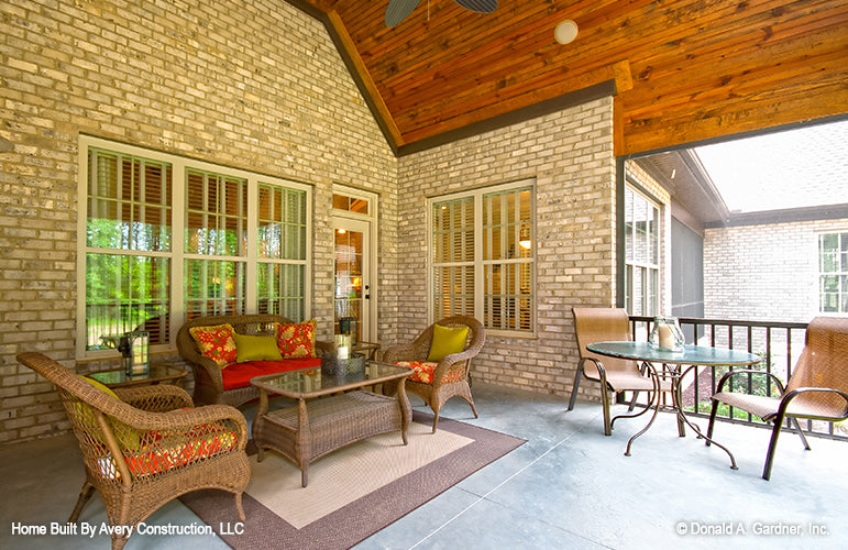 This is a photograph of the screened porch of four bedroom house plan 1117 The Clarkson as built by a customer