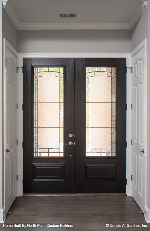 Looking in through the foyer for Craftsman house plan 1272 The Clearlake