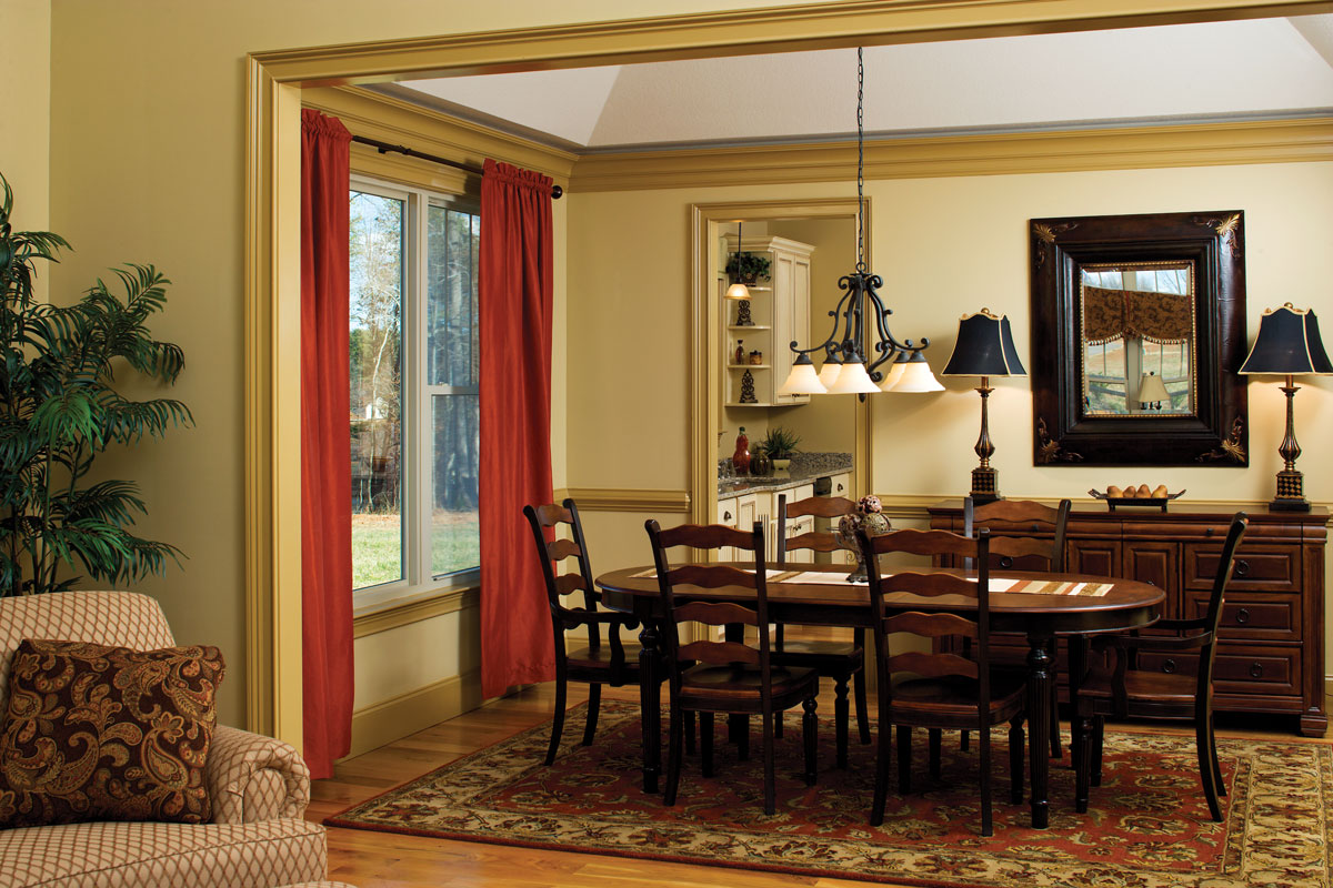 Crown molding along the ceiling in the dining room. The Clearly plan 948.