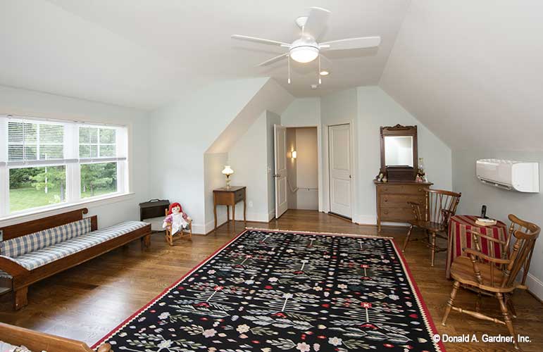 Spacious open bonus room, view facing the entry door. The Cline plan 1419