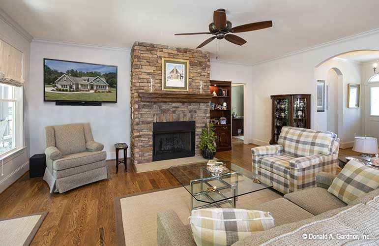 Cozy up in front of the fireplace in the Great room. The Cline plan 1419