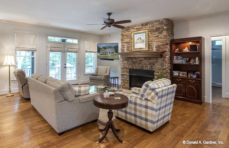 Side view of the Great room, french patio doors and windows give plenty of natural light. The Cline plan 1419