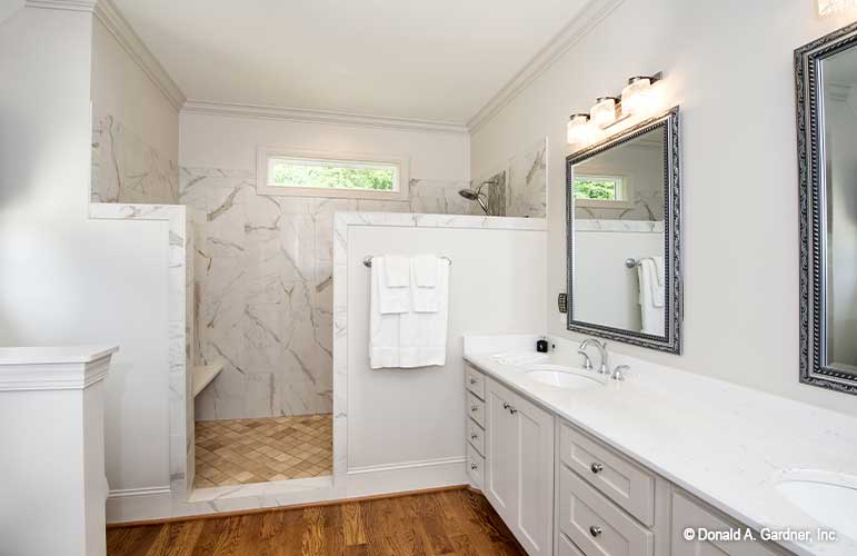 Master bathroom view of the double vanity and walk-in shower. The Cline plan 1419