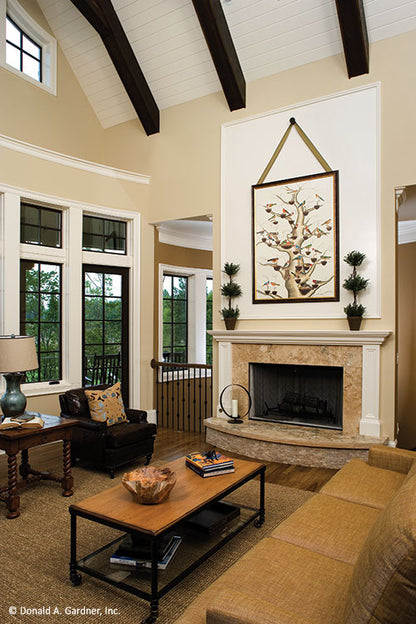 Fireplace with mantel in the great room. The Clubwell Manor plan 5037. 