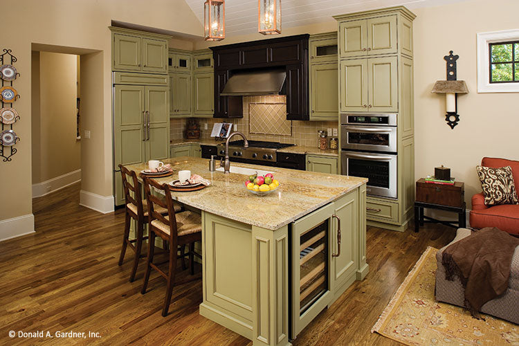 Kitchen island with seating in the kitchen. The Clubwell Manor plan 5037. 