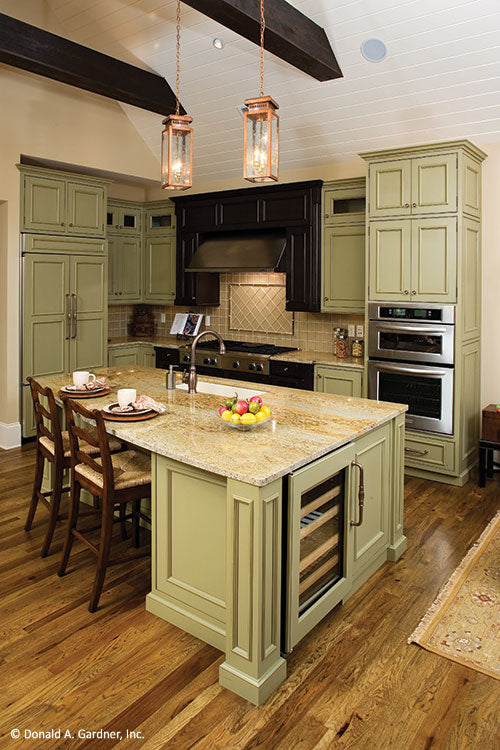 Stainless steel appliances in the kitchen. The Clubwell Manor plan 5037. 