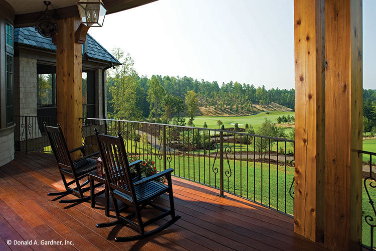 Rocking chairs on the rear porch. The Clubwell Manor plan 5037. 