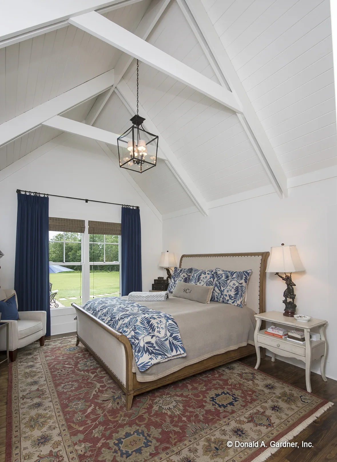 The master bedroom is a quiet retreat in modern farmhouse house plan 1335 The Coleraine