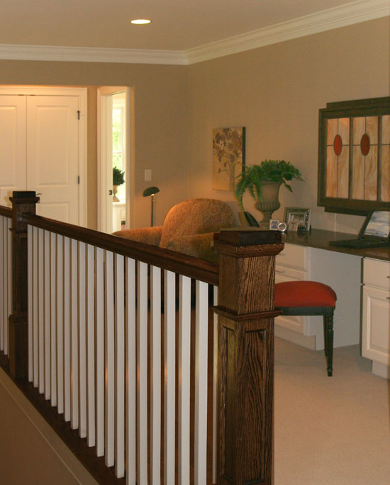 Balcony loft area with a desk. The Collier plan 1216.