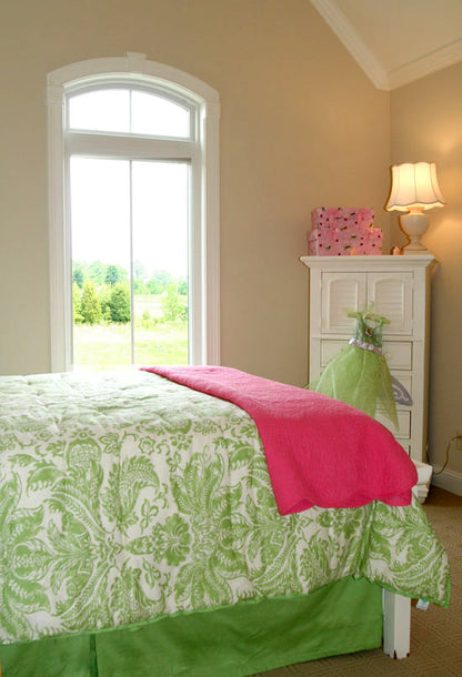 Single arched window in the bedroom. The Collier plan 1216.