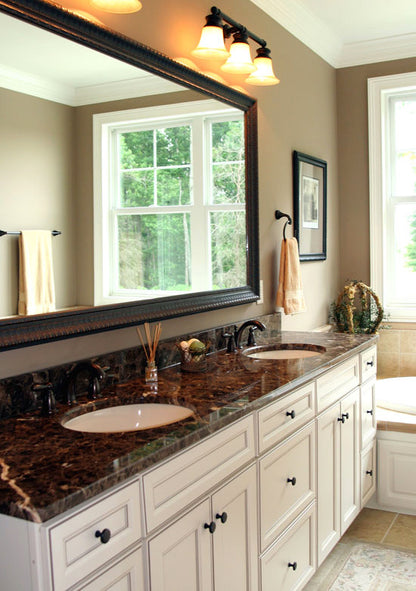 Double sink vanity in the master bathroom. The Collier plan 1216.