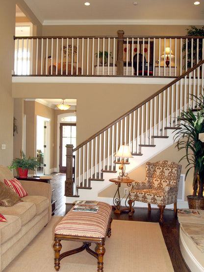 Staircase and balcony view from the great room. The Collier plan 1216.