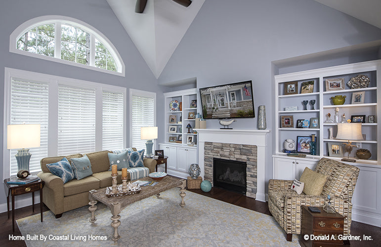 This is a picture of the great room with fireplace of cottage house plan 923 The Colthorpe