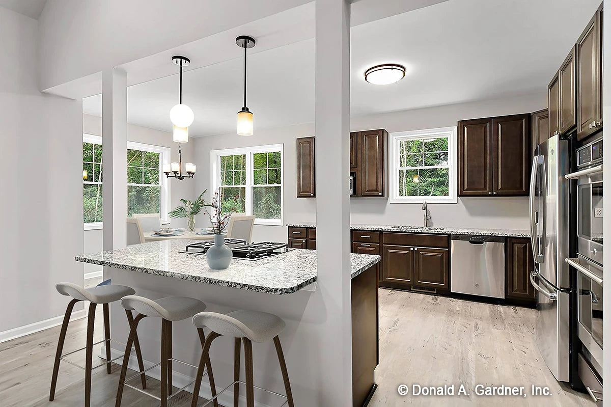 Island kitchen and breakfast nook and granite counter tops