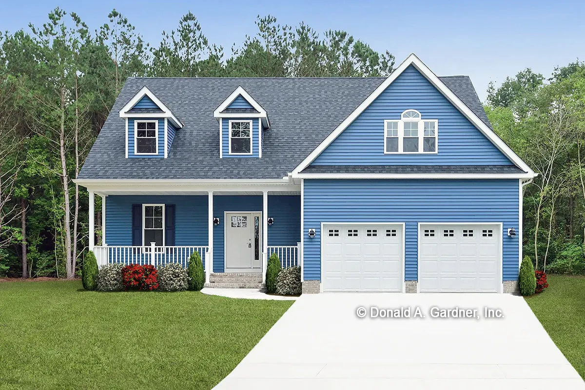 This is a photograph of the front of small house plan 706 The Courtney as built by a customer