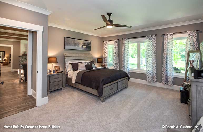 This is a photograph of a bedroom of luxury house plan 732 The Crowne Canyon as built by a customer