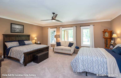 This is a photograph of an additional bedroom of luxury house plan 732 The Crowne Canyon as built by a customer