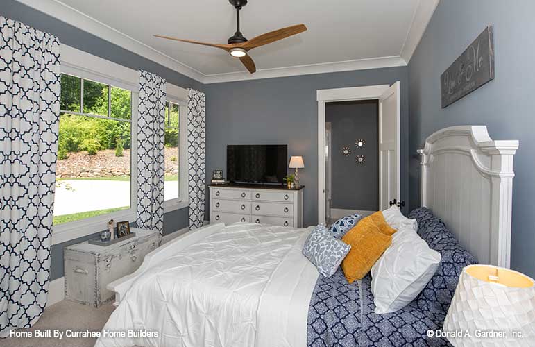 This is a photograph of another bedroom in luxury house plan 732 The Crowne Canyon as built by a customer