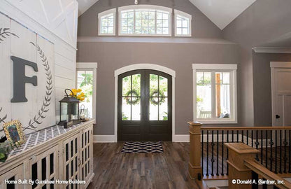 This is a photograph of the foyer of luxury house plan 732 The Crowne Canyon as built by a customer