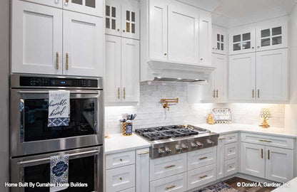 This is a photograph of the kitchen counter space of luxury house plan 732 The Crowne Canyon as built by a customer