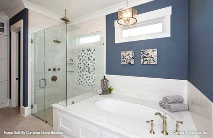 This is a photograph of the master bath tub of luxury house plan 732 The Crowne Canyon as built by a customer