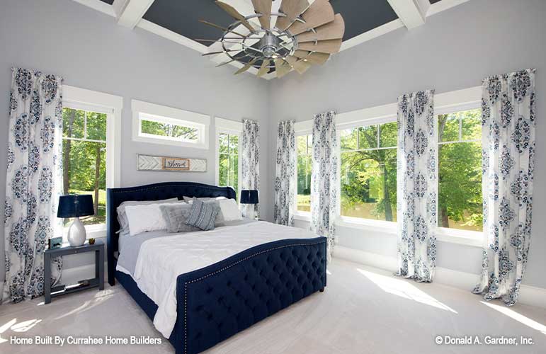 This is a photograph of the master bedroom of luxury house plan 732 The Crowne Canyon as built by a customer