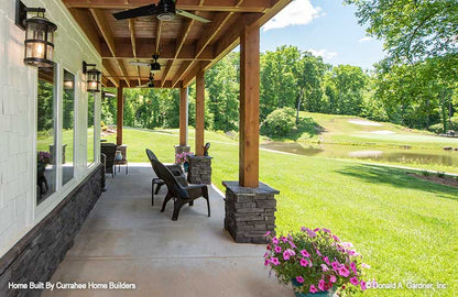 This is a photograph of the patio of luxury house plan 732 The Crowne Canyon as built by a customer