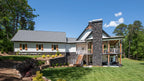 This is a photograph of the rear of hillside house plan 732 The Crowne Canyon as built by a customer