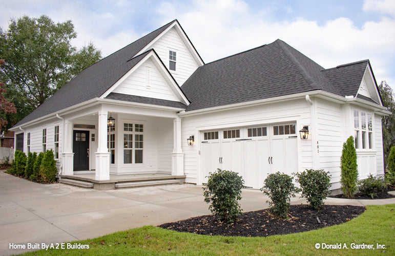 This is a photograph of the front of small house plan 1025 The Currier as built by a customer