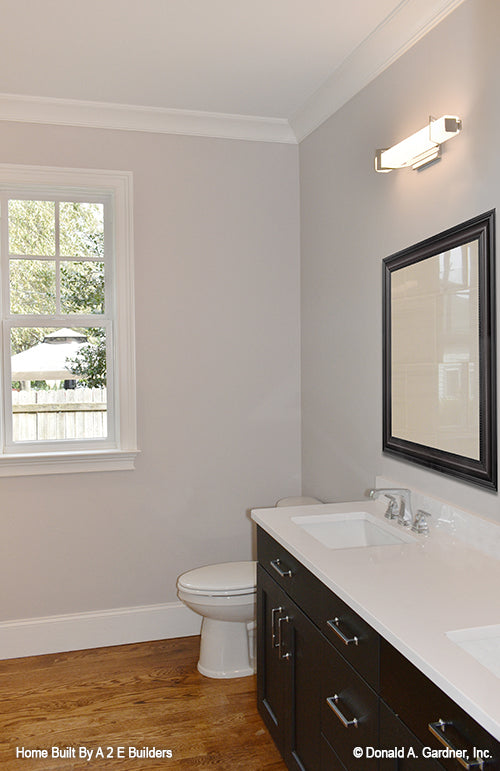 This is a picture of the master bathroom vanity with double sinks of house plan 1025 The Currier