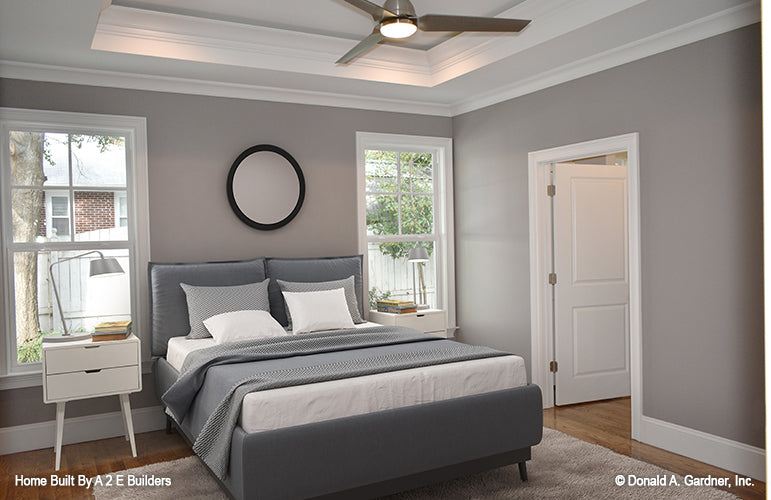 This is a picture of the master bedroom and windows of house plan 1025 The Currier