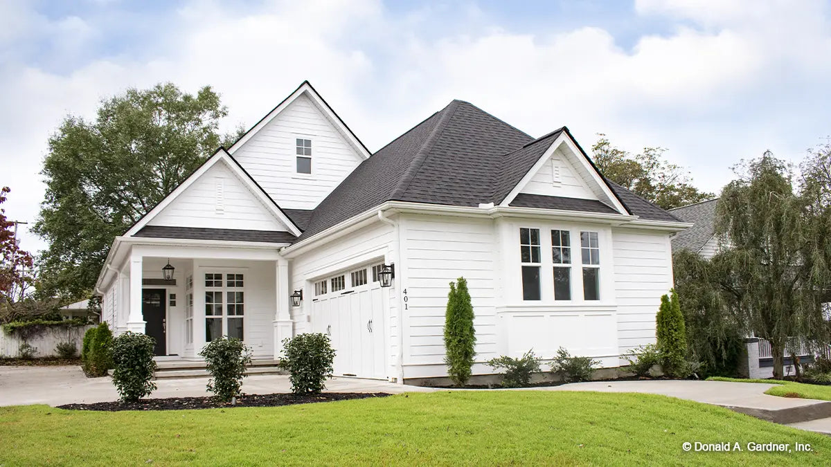 This is a photograph of the front of small house plan 1025 The Currier as built by a customer