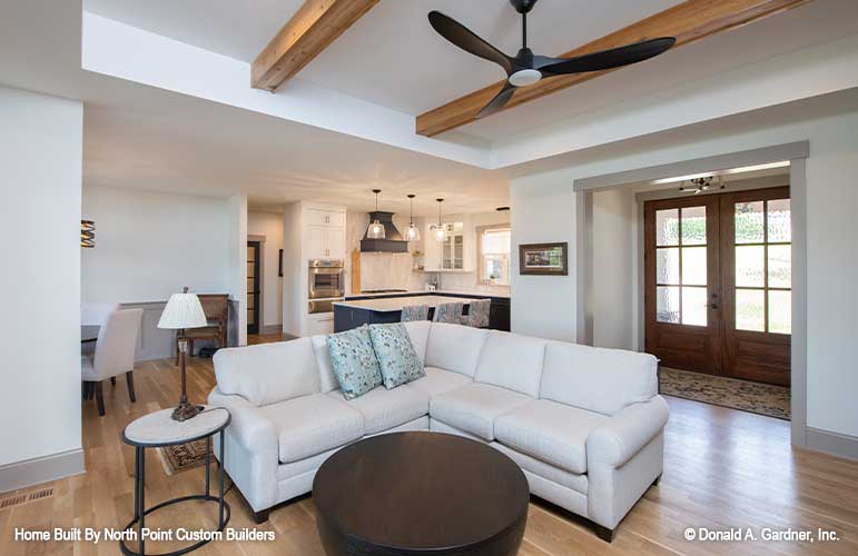 Welcoming great room with beautiful wood beams on the ceiling. Dawson plan 1502