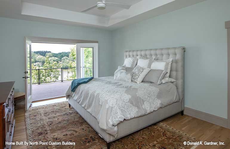 Gorgeous view to wake up to in the master bedroom with the French doors open to the deck. Dawson plan 1502