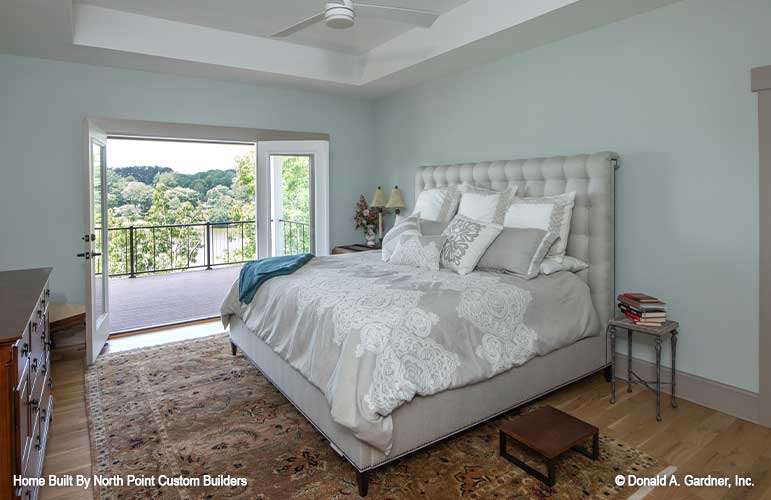 Gorgeous view to wake up to in the master bedroom with the French doors open to the deck. Dawson plan 1502