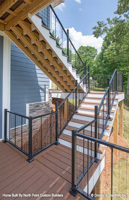 Beautiful decking leading up to the exterior staircase. Dawson plan 1502