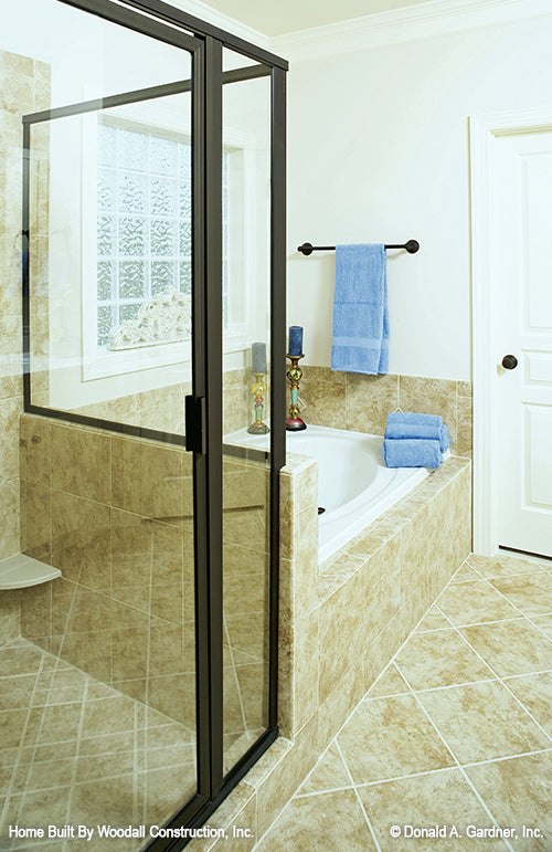 Walk-in shower next to the soaking tub in the master bathroom. The Dayton plan 1008.