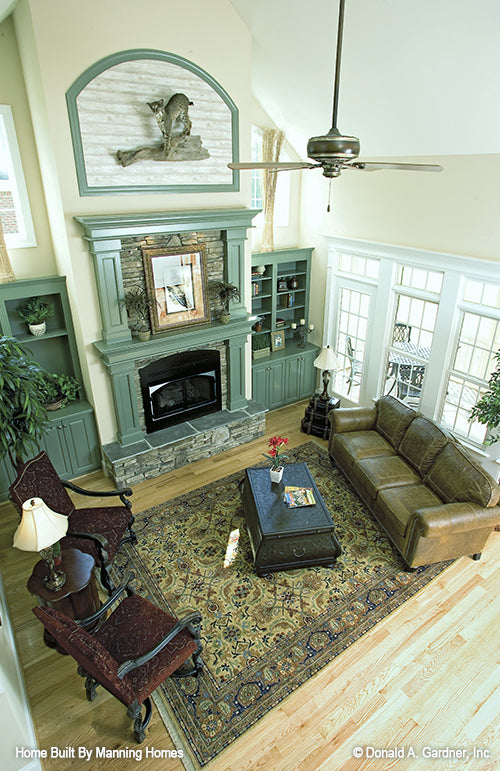 This is picture of the great room and fireplace as built by a customer of four bedroom house plan 1032 The Derbyville