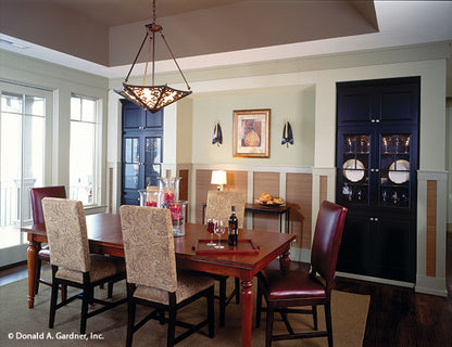 Chandelier in the dining room with tray ceiling. The Dogwood Ridge plan 5005.