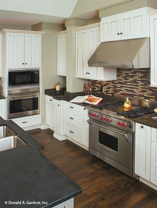 Stainless steel appliances in the kitchen. The Dogwood Ridge plan 5005.