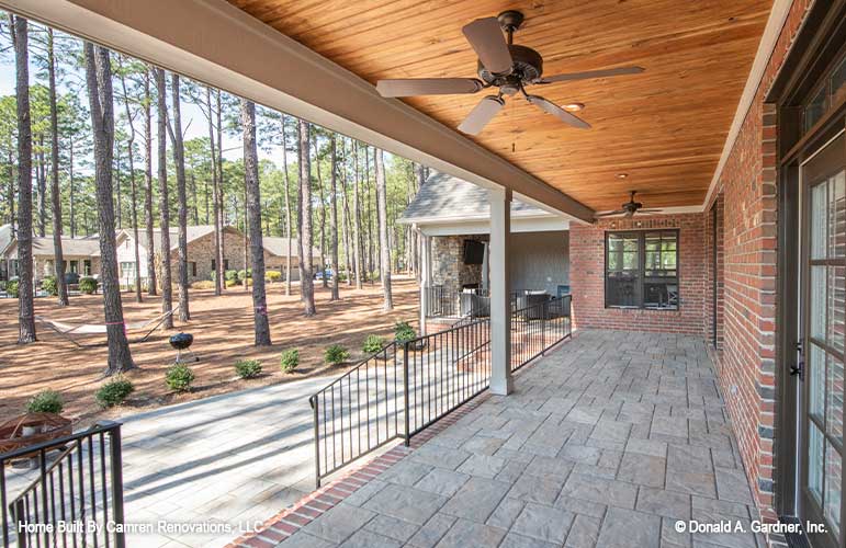 Another rear porch view for open concept house plan 1371 The Drake