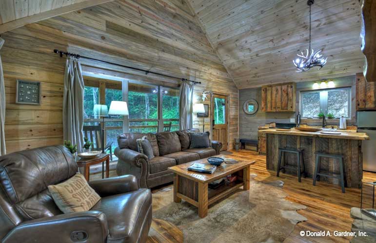 This is a great room picture of cabin house plan 1601 The Dwight as built by a customer