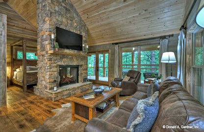 This is picture of great room fireplace of cabin house plan 1601 The Dwight as built by a customer