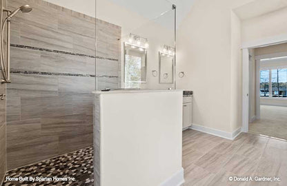 Walk-in shower in the master bathroom. The Ella plan 1344.