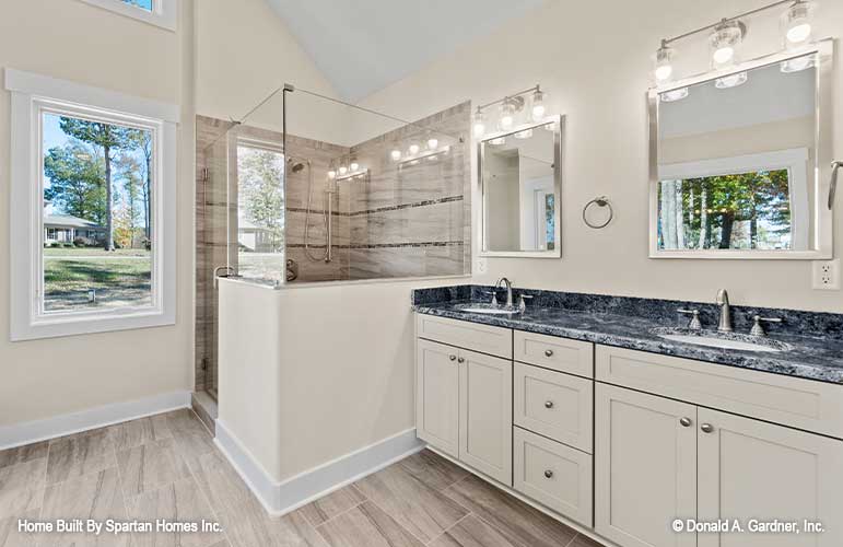 Double sink vanity in the master bathroom. The Ella plan 1344.